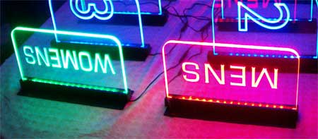 edge lit signs to locate restrooms